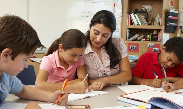 A teacher with elementary school children